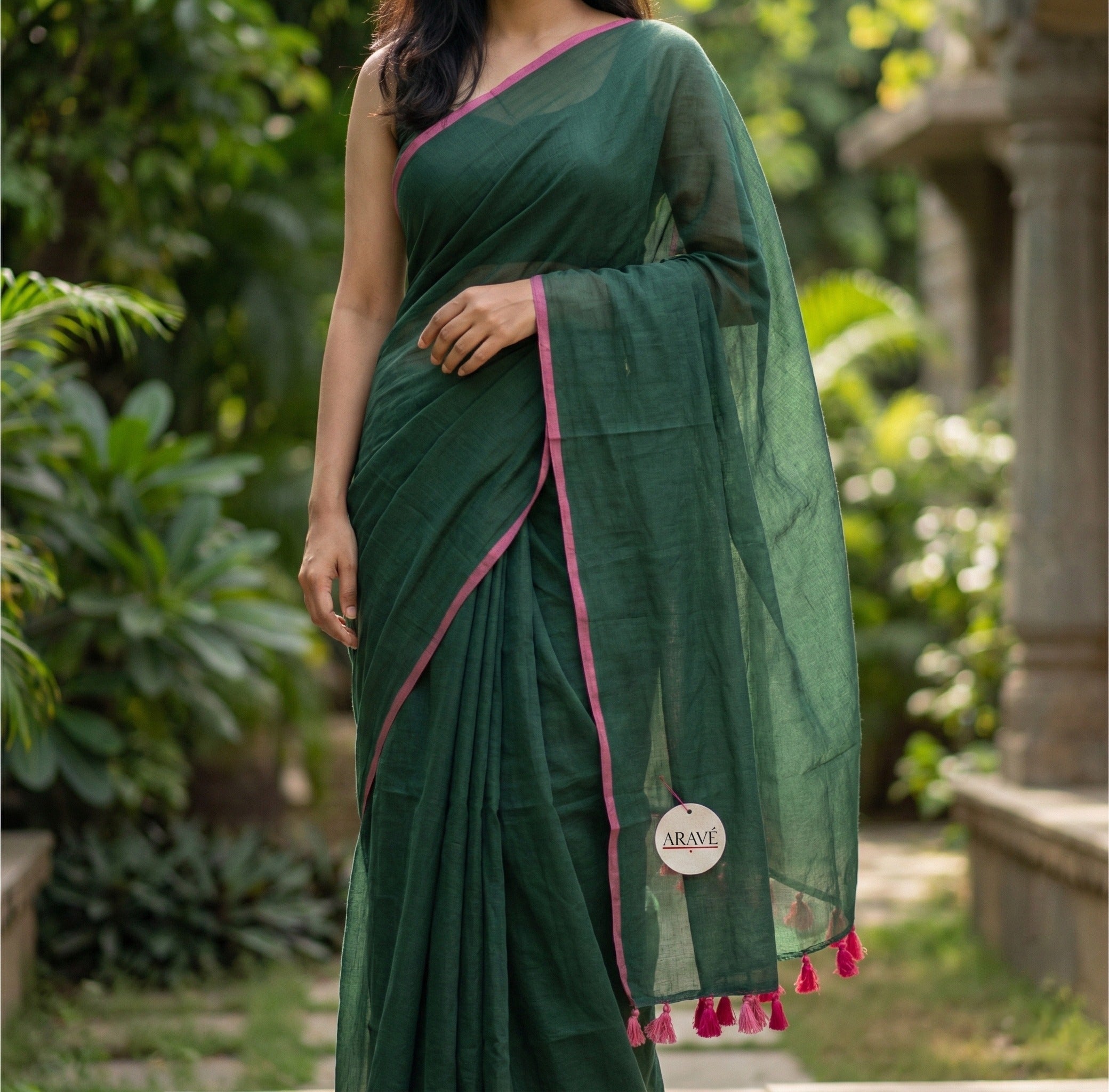 Gulabi Edge - Bottle Green Mulmul Saree with Thin Pink Border and Pink Tassels