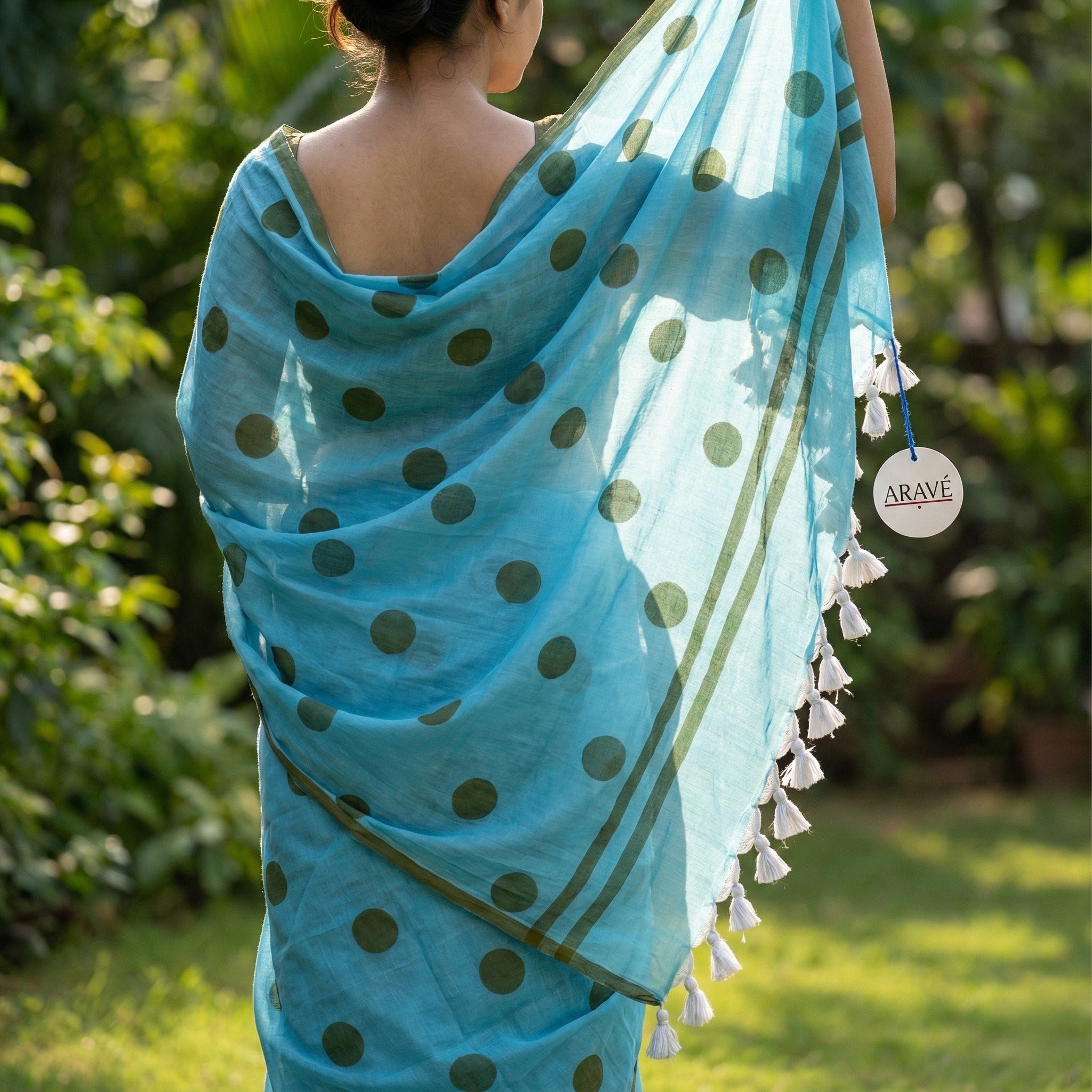Aasmaa Charm - Sky Blue Mulmul Saree with Thin Olive Border, Olive Polka Dots, and White Tassels