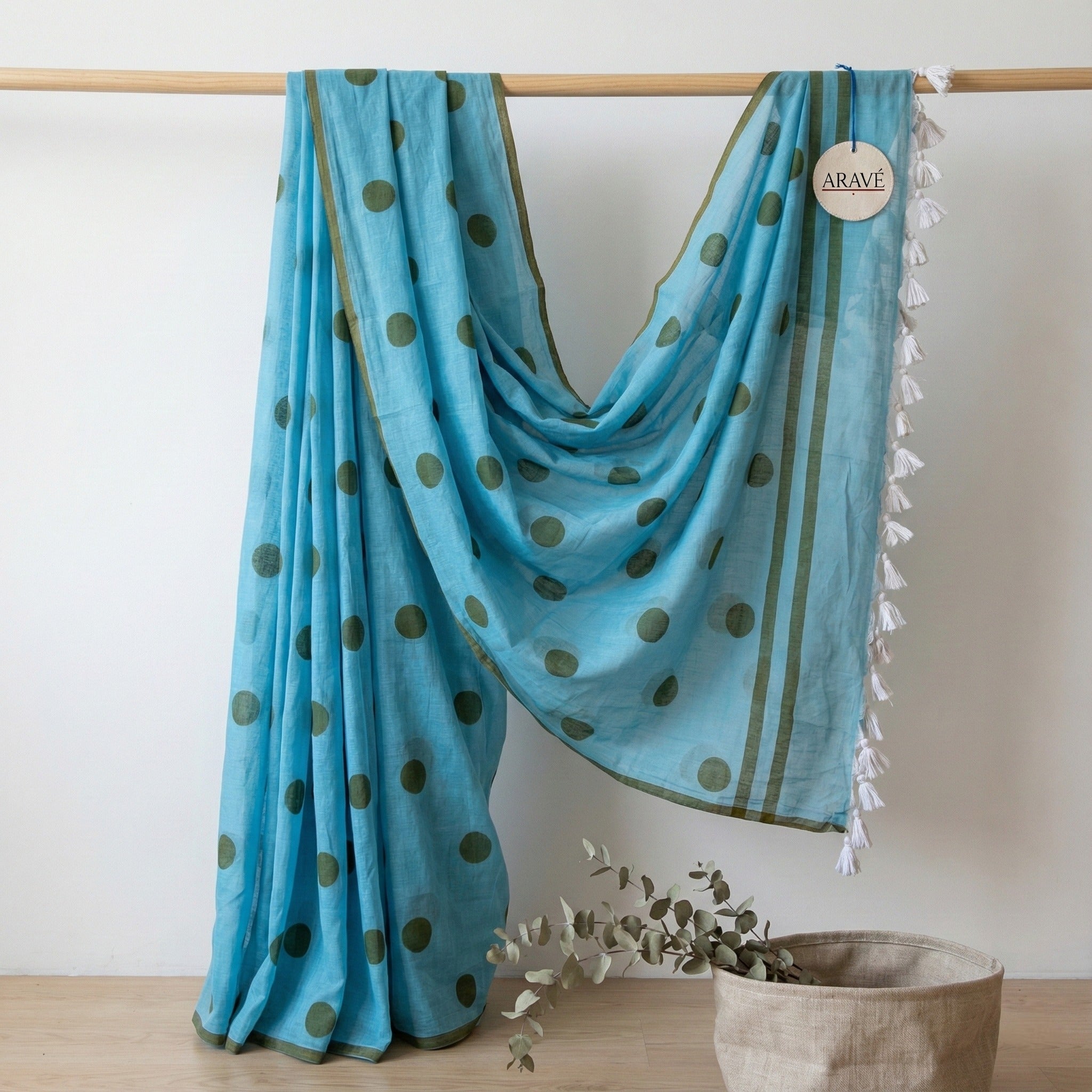 Aasmaa Charm - Sky Blue Mulmul Saree with Thin Olive Border, Olive Polka Dots, and White Tassels