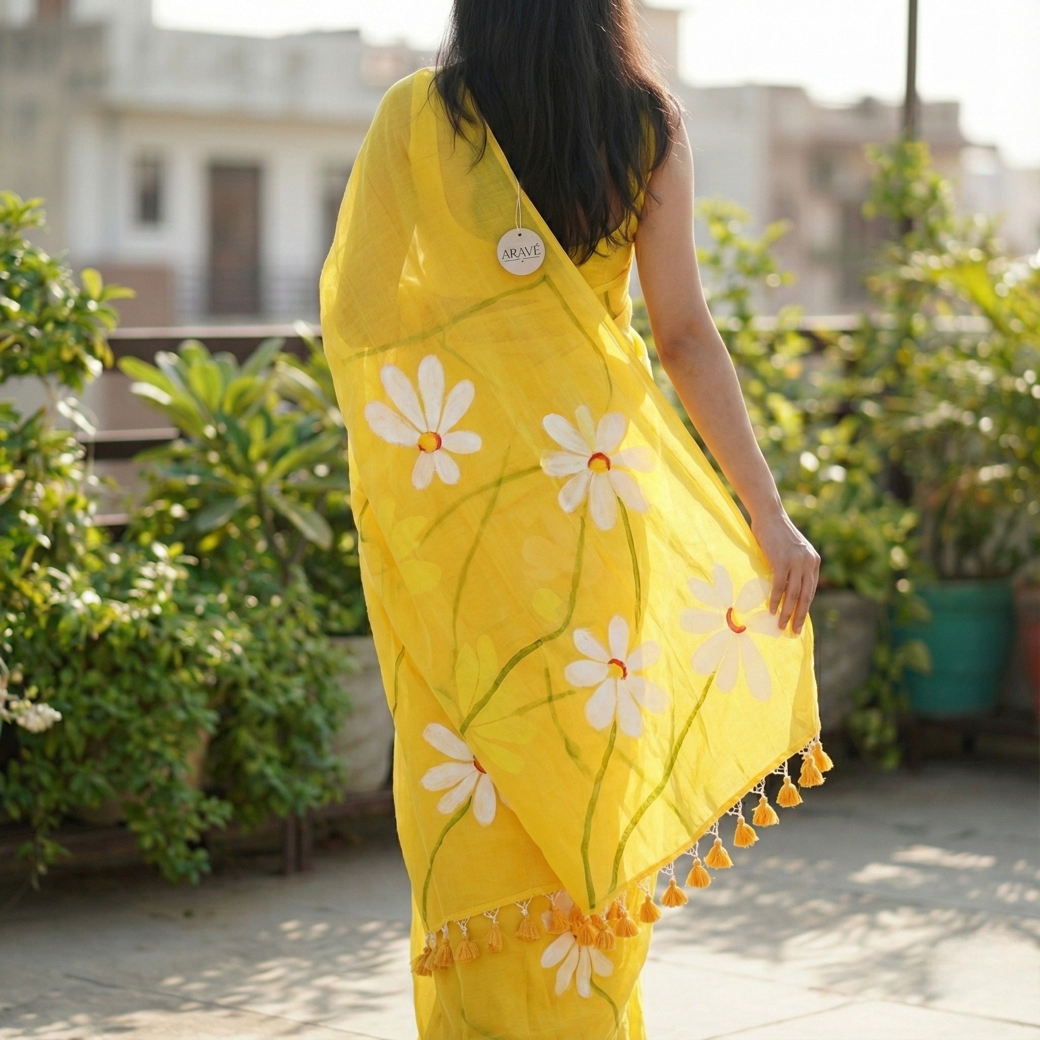 Sunehri Daisy - Mustard Yellow Mulmul Saree with Hand-Painted Daisy Motifs and Orange Tassels