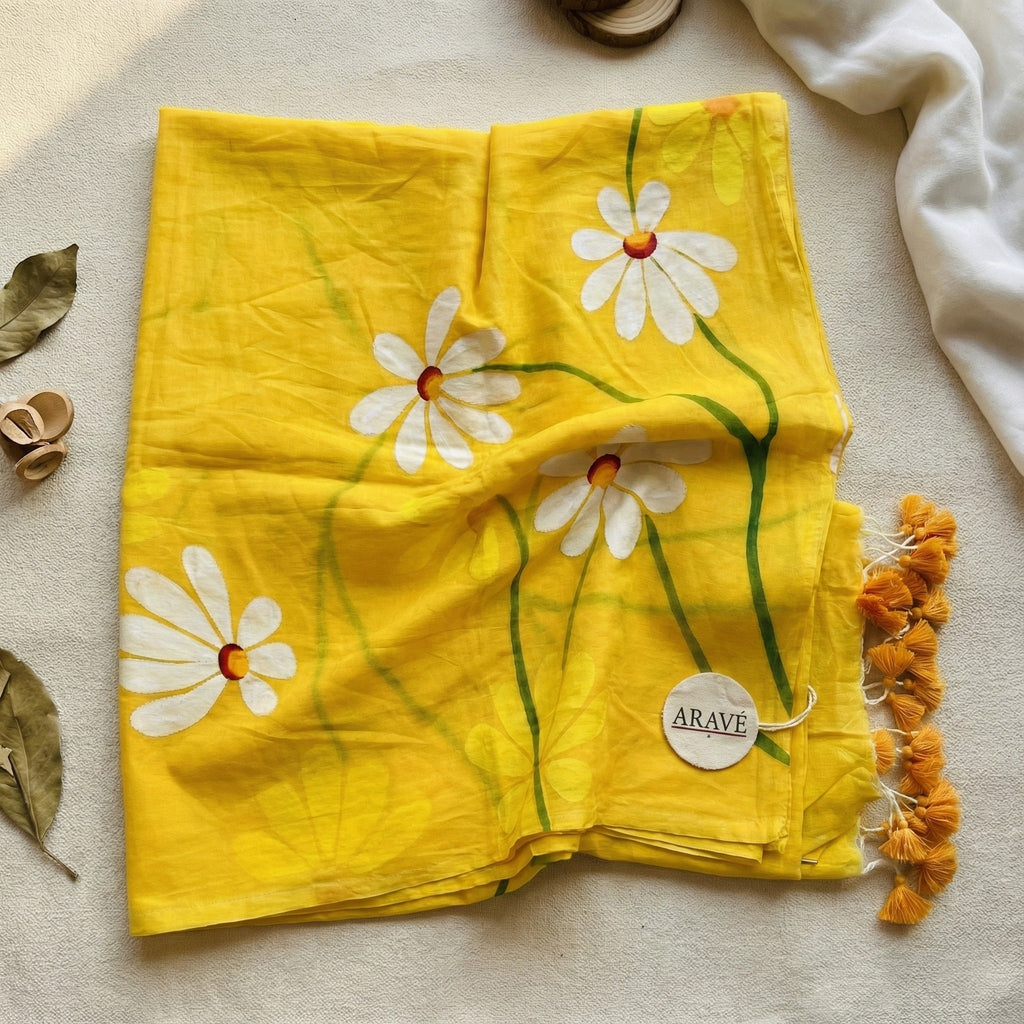 Sunehri Daisy - Mustard Yellow Mulmul Saree with Hand-Painted Daisy Motifs and Orange Tassels